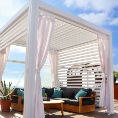 White Cabana X with white louvers on a rooftop terrace